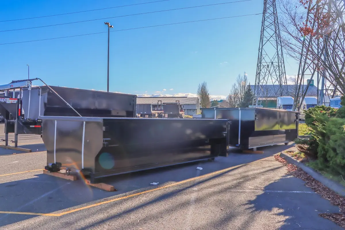 Roll-off dumpster ready for waste disposal at job site for 2 Yard Dumpster Rental in Kings Mountain